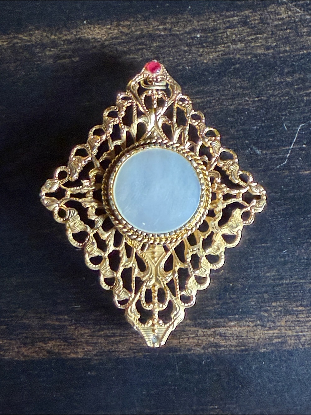 Vintage gold filigree brooch with mother of pearl inlay